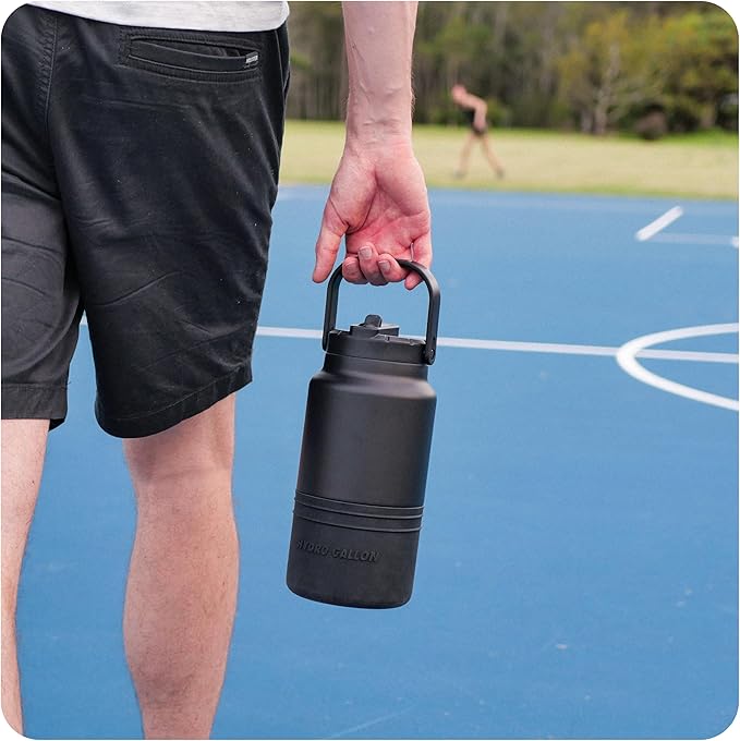 Hydro Gallon® Nomad - Insulated 64oz Half Gallon Water Bottle Jug with Sleeve, Straw Lid, Handle, Strap, Pockets. Large Stainless Steel Metal Gym Thermos. Wide mouth, Leakproof, BPA free. 62oz (Black)
