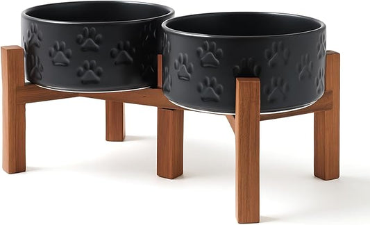 SPUNKYJUNKY Ceramic Elevated Dog Bowl Set with Acacia Wood Stand for Food and Water for Small Medium Sized Dogs (28.74 OZ, Black, Dog Paw Pattern)