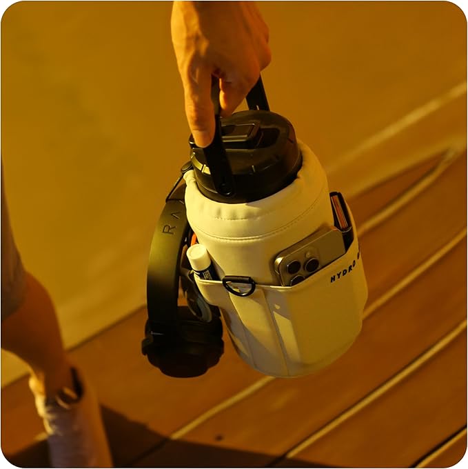 Hydro Gallon® Nomad - Insulated 64oz Half Gallon Water Bottle Jug with Sleeve, Straw Lid, Handle, Strap, Pockets. Large Stainless Steel Metal Gym Thermos. Wide mouth, Leakproof, BPA free. 62oz (Beige)