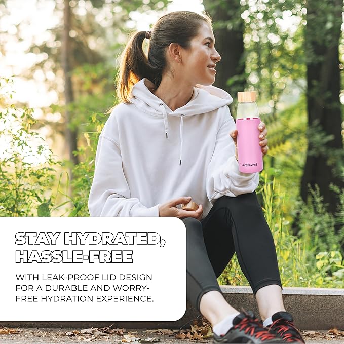 HYDRATE Bottles 20oz Glass Water Bottle with Bamboo Lid - Clear Refillable Bottle with Pink Silicone Sleeve - Leak-Proof Lid - Classic Design for Extra Convenience - Ideal for Drinking Water, Juice